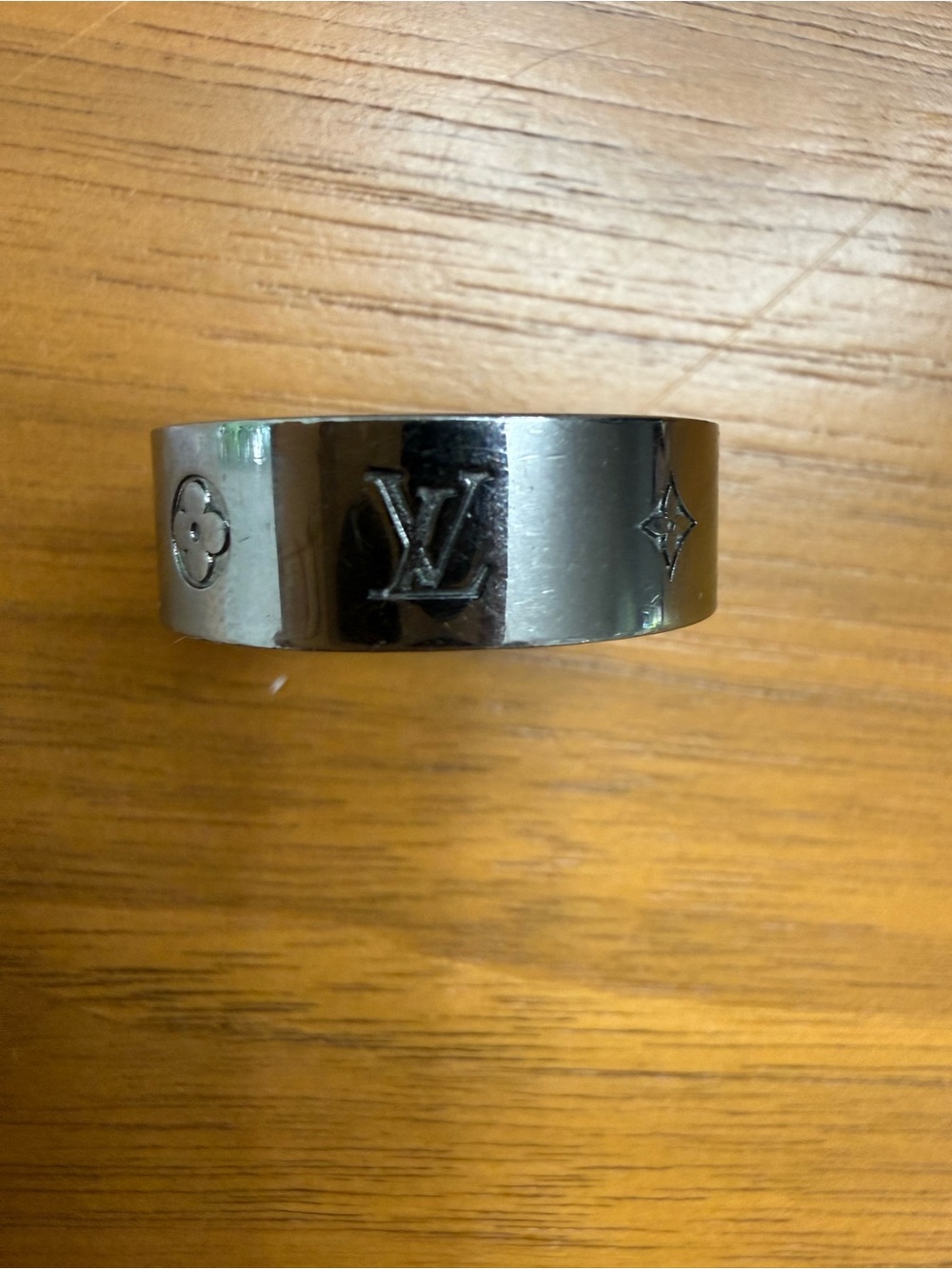 Authentic Louis Vuitton Polished Silver Monogram Band Ring